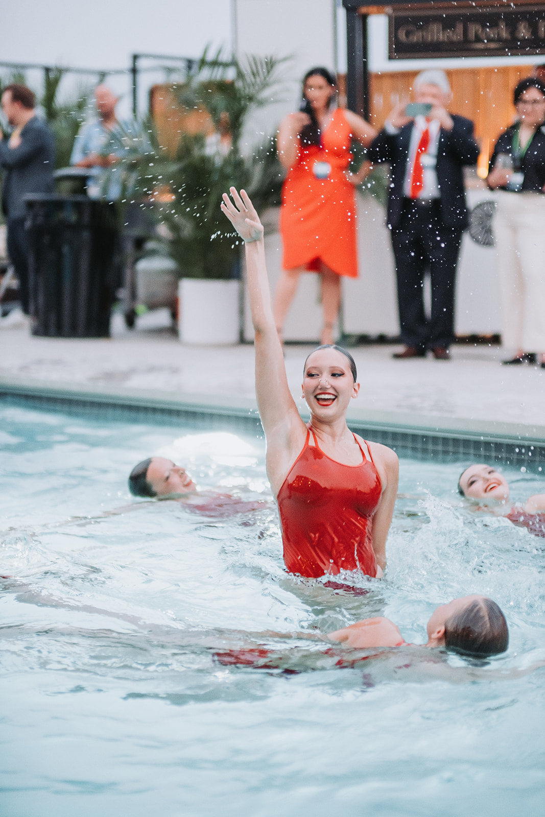 Corporate branded synchronized swimming performance