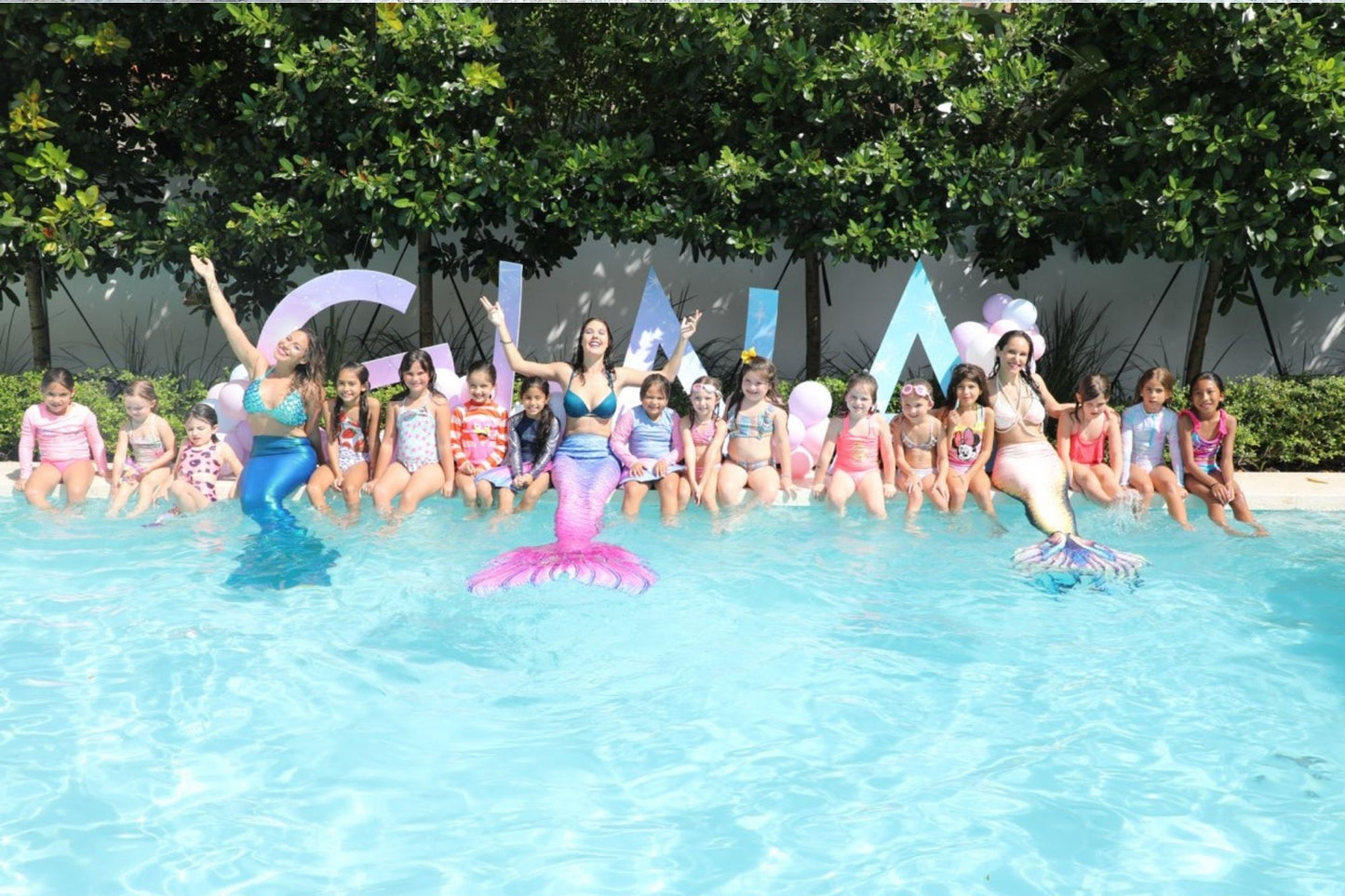 Mermaid gathering kids party school mermaid swimming pool. miami
