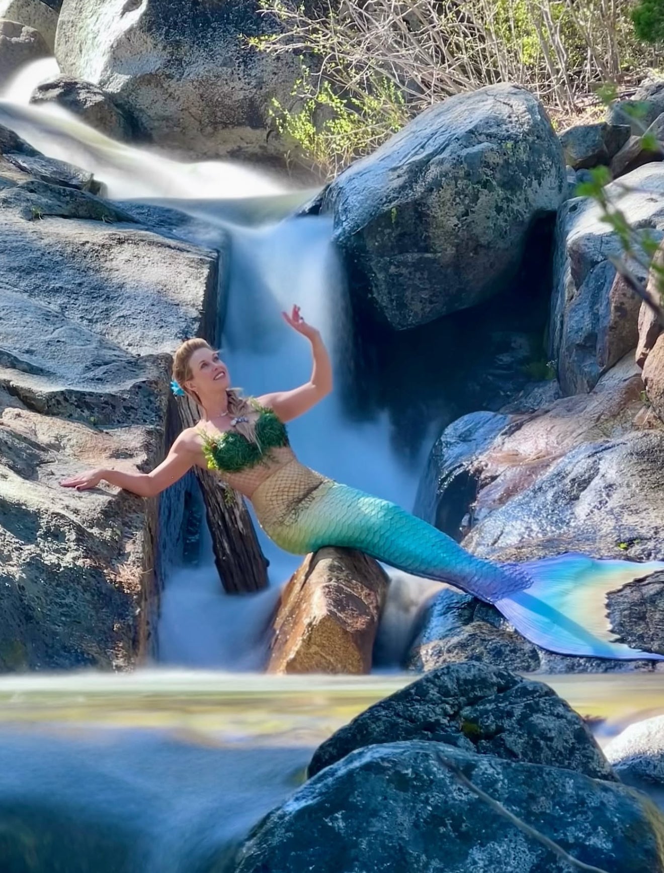Mermaid by waterfall